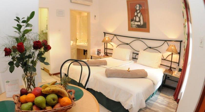 Garden Place Guest Houses Йоганнесбурґ Номер фото